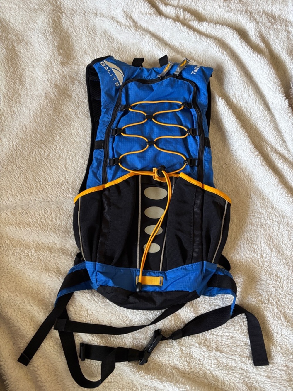 Blue and Black Golite Tailwind Hydration Pack with Yellow Accents